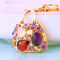 Golden handbag keychain with colorful rhinestones and purple oval gemstone - Purple Crystal Handbag