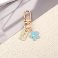 Portachiavi fiore in smalto blu con targhetta dorata e chiusura a molla con anello a D - Blu
