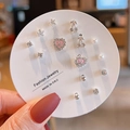 Detail view of silver earring set featuring pink hearts and pearls on display card - Silver Cherry Heart (E0364-1)