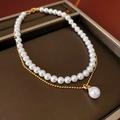 Detailed view of layered faux pearl necklace set with gold plated pendant on a display tray - 8mm Pearl Double Layer Necklace 2pcs Set