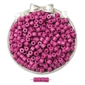 Magenta cylindrical acrylic beads for DIY jewelry displayed in a silver tray - Purple