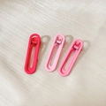 Set of three colorful y2k star-inspired hair clips in red, light pink and rose shades - Pink Hollow Clip Set (Set of 3)