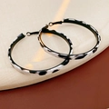Detail of round leopard print hoop earrings with black and white pattern on textured surface - Black and White Zebra Pattern (Silver Pin-White-Large)