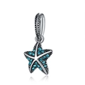Polished silver starfish pendant with blue gemstones on a clean white background - Sea Star / Blue Stone