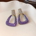 Macro shot of silver needle earrings featuring purple and white pavé zircon details - 38# Silver Earring Post - Purple