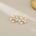 Elegant vintage gold earrings with pink crystals and pearls in a classic palace style - Spiral Clip-on Style / Gold with Pink Pearl