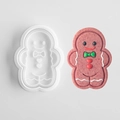 Gingerbread man cookie cutter set with white plastic mold and decorated ginger cookie - Gingerbread Man B