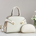 Chic cream white tote bag with matching tassel and small purse on clean white background - White