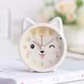 White kitten-themed analog alarm clock with decorative cat ears on a lifestyle background - Creamy White Cat Alarm Clock
