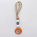Orange heart-shaped Evil Eye wall hanging with woven hemp rope and blue beads, 18cm long - Orange Round