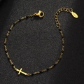 Detail of gold beaded cross bracelet with black beads and S.Steel engraving tag - Gold-Black
