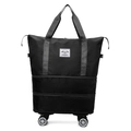 Expandable black travel bag with rolling wheels and durable nylon woven handles - Black