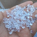 Primo piano di chiusure per orecchini in silicone trasparente a forma di fiore - Chiusura a Fiore di Prugno Orecchino 5*3mm / Trasparente