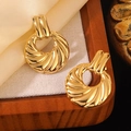 Golden spiral textured hoop earrings with a radiant metallic finish on silk background - Gold Spiral Radiating Texture Hoop Earrings