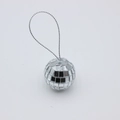 Close-up of a silver disco ball ornament with reflective mosaic tiles and a silver string - 3cm Ribbon (12 Pack PVC Box)