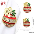 Golden Christmas napkin ring with red enamel bauble and sparkling white rhinestones - Christmas Ball Style 57