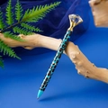 Blue and black leopard print metal pen with a large diamond top on a wood branch - Light Blue Leopard