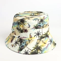 Detail of beige bucket hat featuring tropical coconut trees and sailboat prints - M (56-58cm) / Beige Tropical Beach Print