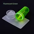 Macro shot of fluorescent green nail stamper set with clear cap and scraper tool - Single Head Stamper Style / Fluorescent Green