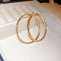 Detailed view of polished gold hoop earrings presented in a white minimalist jewelry box - Gold Smooth Large Hoop (31#) / Gold