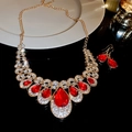 Vintage gold jewelry set with red teardrop gemstones and necklace and earrings - Red Waterdrop Tassel