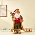 Père Noël traditionnel en gilet rouge et pantalon vert tenant une boîte cadeau - 60CM