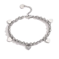Macro shot of silver heart charm bracelet in stainless steel with sparkling zircon stone - Silver