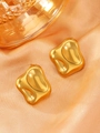 Detail of irregular gold earrings with lava texture on warm orange satin background - 18K Gold Plated (11446)