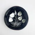 Coconut shell bowl with silver leaf pattern and polished dark natural exterior - White Leaf Style