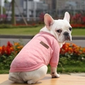 Pink knitted pet sweater for French Bulldogs with classic leather patch and warm texture - Pink