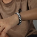 Mens textured steel bracelet with bold silver and black heavy industrial metal link design - X Texture Bracelet / Steel Black