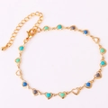 Detail of gold heart link bracelet with colorful blue and white enamel charms and clasp - Multicolor Bracelet 4 (Ocean Tones)