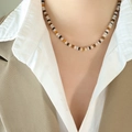 Zebra pattern agate beaded necklace in white black and brown worn with beige blazer - Gold/Mixed