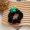 Black velvet hair scrunchie with a green plush Christmas tree charm and yellow star - Black Christmas Tree