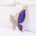 Creative butterfly keychain with blue enamel and sparkling rhinestones in gold finish - Individual Packaging / Blue