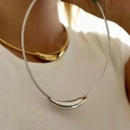 Sleek silver bean pendant snake chain necklace worn on a white t-shirt for women - Silver Curved Tube
