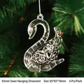 Close-up of clear acrylic swan ornament with hollow carvings for Christmas tree decor - 65mm Swan Pendant