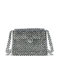 Close-up of handmade silver beaded crossbody bag featuring metallic woven pearl details - Silver