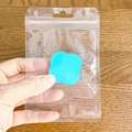 Teal petal-shaped accessory in a clear resealable pouch with hanging hole - 10.5x15cm * Macaron Double-sided Transparent * 16 Silk