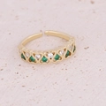 Macro detail of gold-plated open ring with heart patterns and green zircon inlay - Green Heart Row Pave Style (2#)