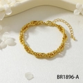 Detailed shot of golden link bracelet with lobster clasp on elegant white silk and flowers - Double Loop Braided Style (BR1896-A)