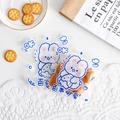 Self-sealing snack bag with blue cartoon rabbit design and cute cookies inside - Everything Cute / 13.5 x 13.5cm