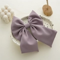 Elegant Morandi purple bow hair clip in twill fabric on a decorative ceramic tray - Lavender