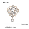 Broche vintage dorée avec strass clairs et pendentif floral, hauteur de 9,7 cm - Base Or Blanc