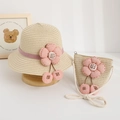 Detail of girls straw sun hat and matching flower bag with purple ribbon and pink petals - Hat + Bag Set / Beige