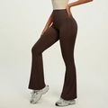 High-waisted chocolate brown flared yoga pants showing butt lift and split hem detail - Distilled Coffee