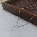 Collana a sfere argentata con ciondolo a cuore cavo minimalista per un look quotidiano - Collana a Cuore con Catena a Sfere Singola