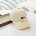 Detail of blue DINO embroidery on a beige cotton canvas baseball cap for kids - 54cm 3-8 Years Old / Off White