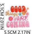 Detail of GOOD THINGS ARE COMING embroidered patch with guitar and flower motifs - No. 3 (Good Things Are Coming)