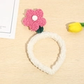 Pink plush flower headband with white band on wooden table for skincare routine - Rose Red Small Flower